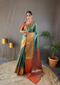 Ornate Green Color Kanchi Pattu Silk Saree