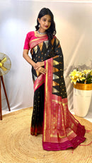 Ornate Black Color Kanchipuram Semi Silk Saree