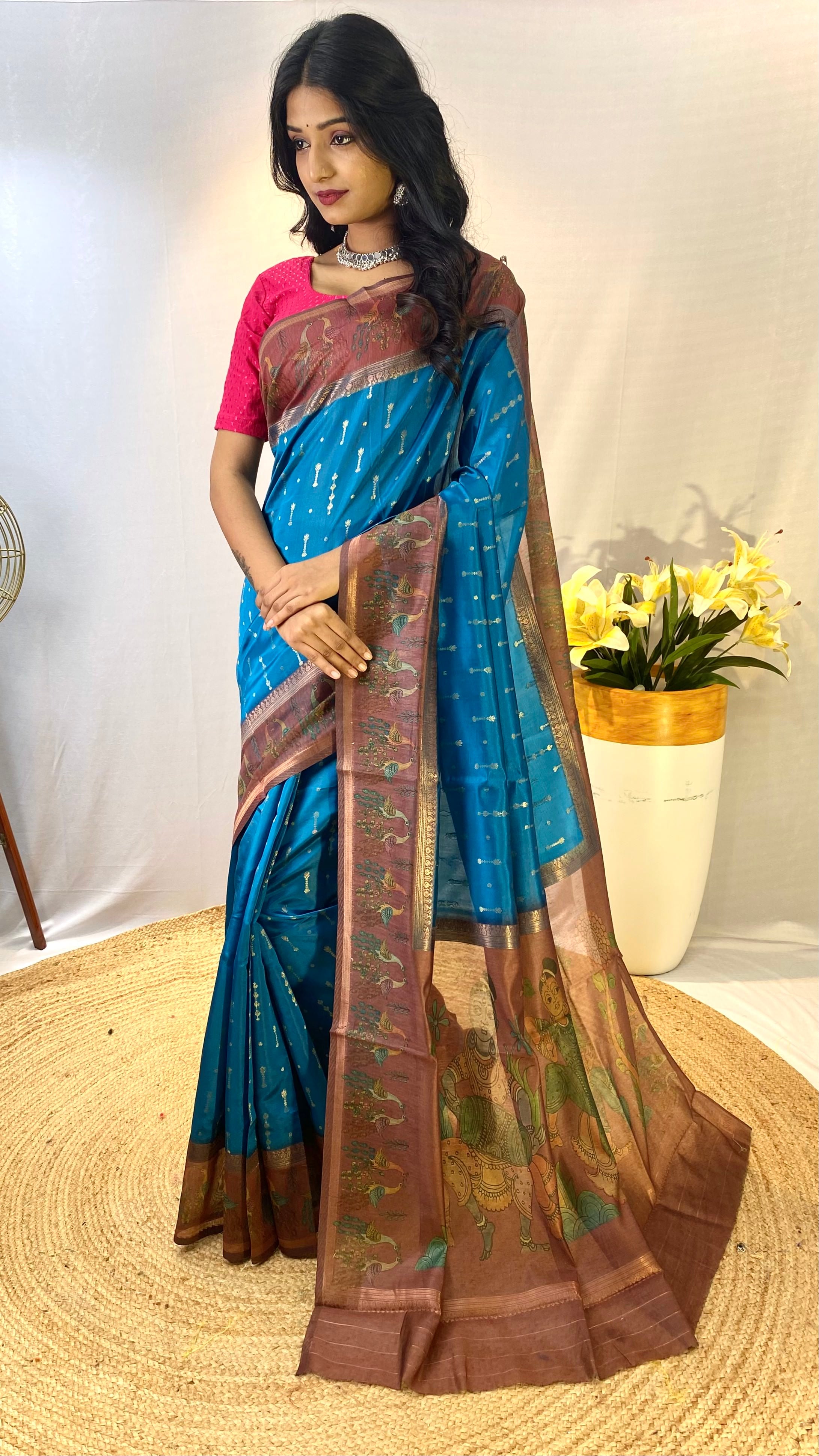 Glamorous Firozi Blue Color Chanderi Silk Saree