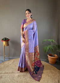 Luminescent Lavender Color Paithani Silk Saree with Rich Peacock Design on Pallu