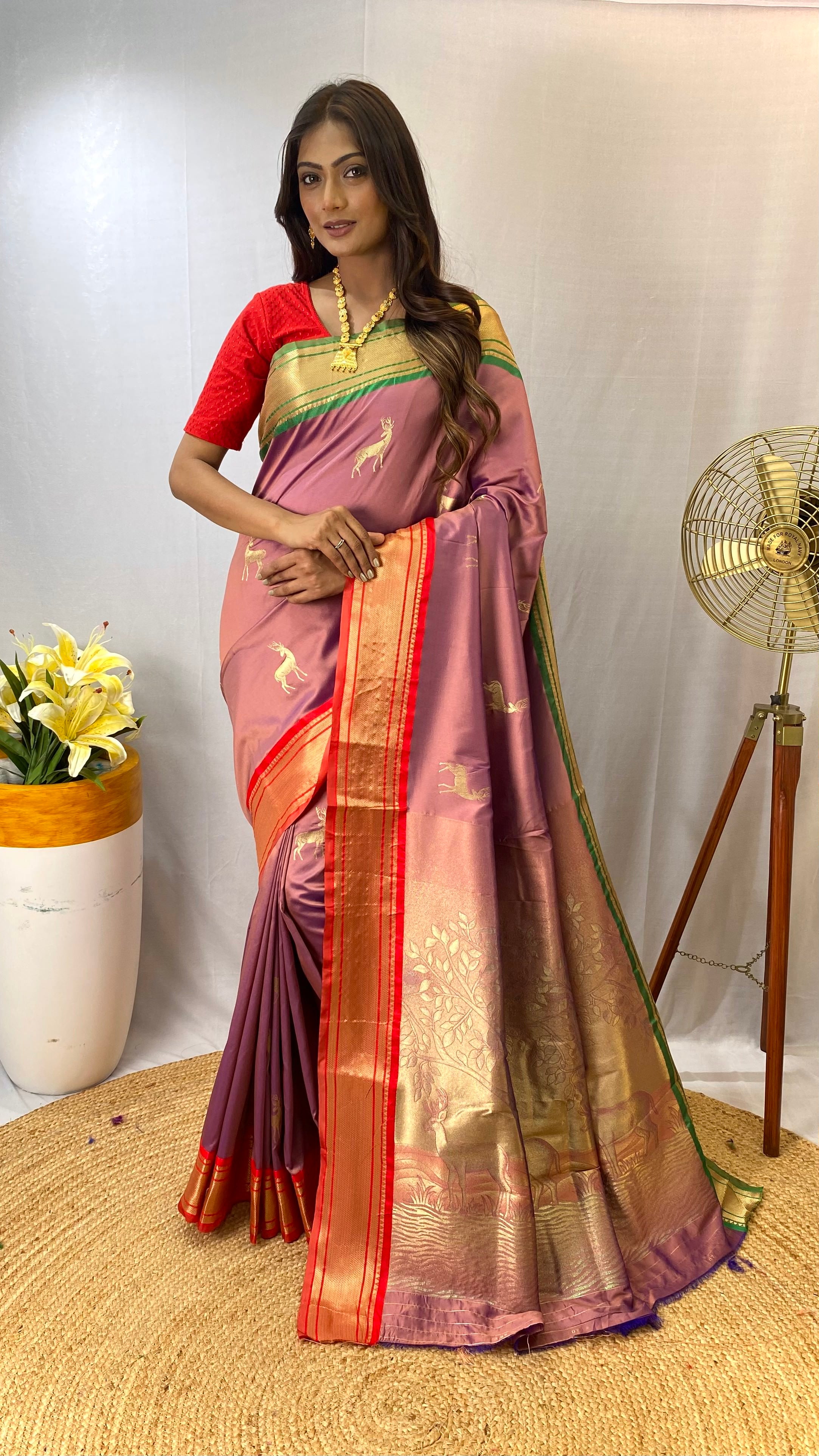 Dazzling Lavender Color Soft Silk Saree with Deer Motifs