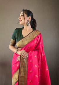 Opalescent Pink Color Paithani Silk Saree with Rich Peacock Design on Pallu