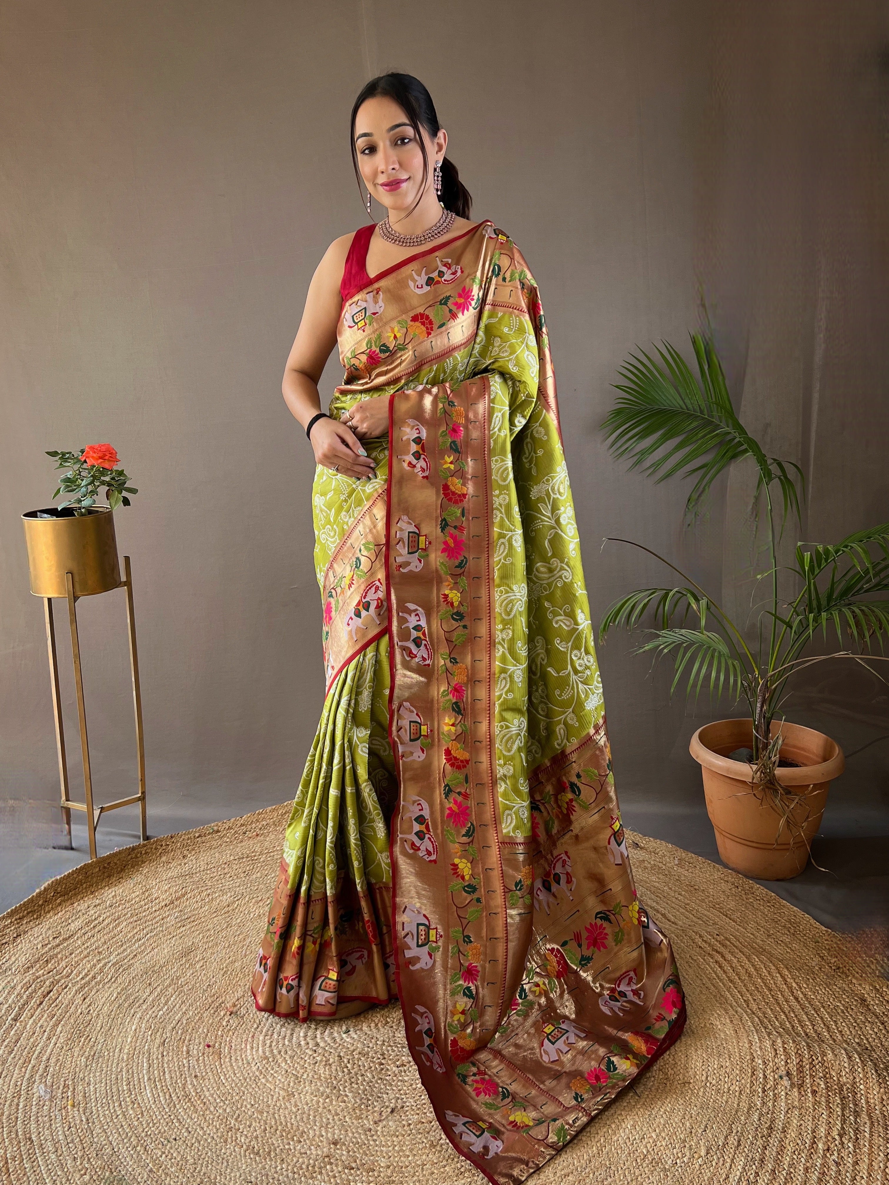 Winsome Pista Green Color Silk Saree with Paithani & Patola Blend