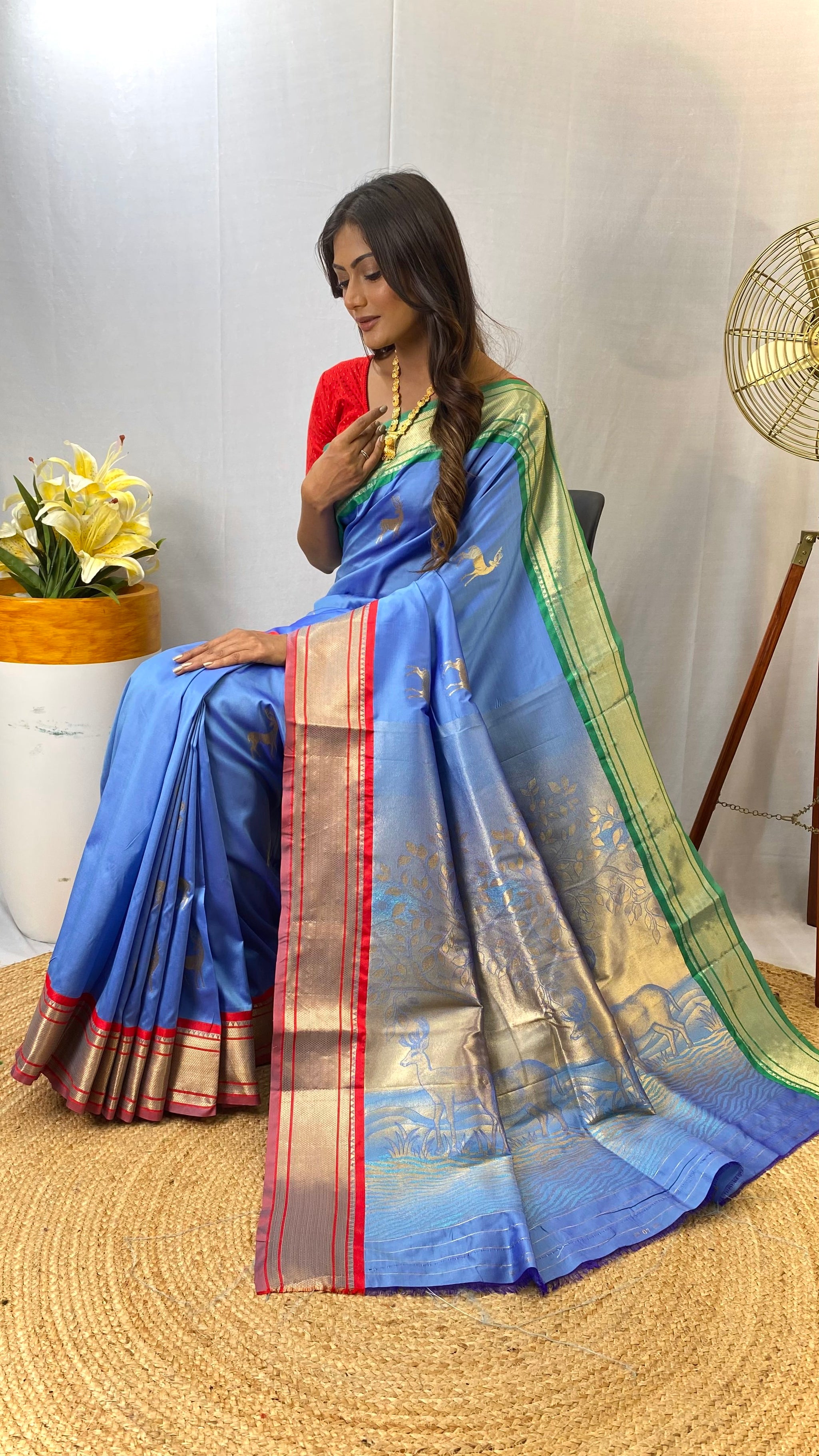 Blissful Sky Blue Color Soft Silk Saree with Deer Motifs