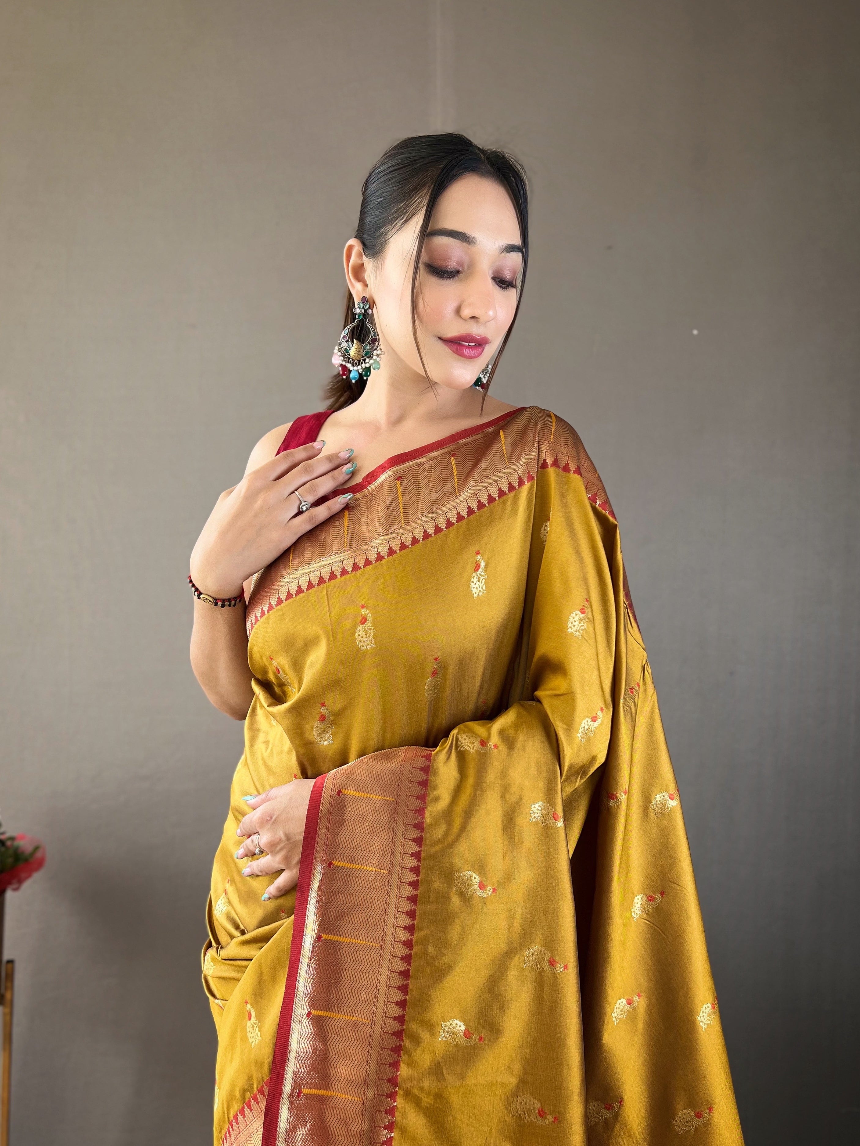 Exotic Yellow Color Paithani Silk Saree with Rich Peacock Design on Pallu