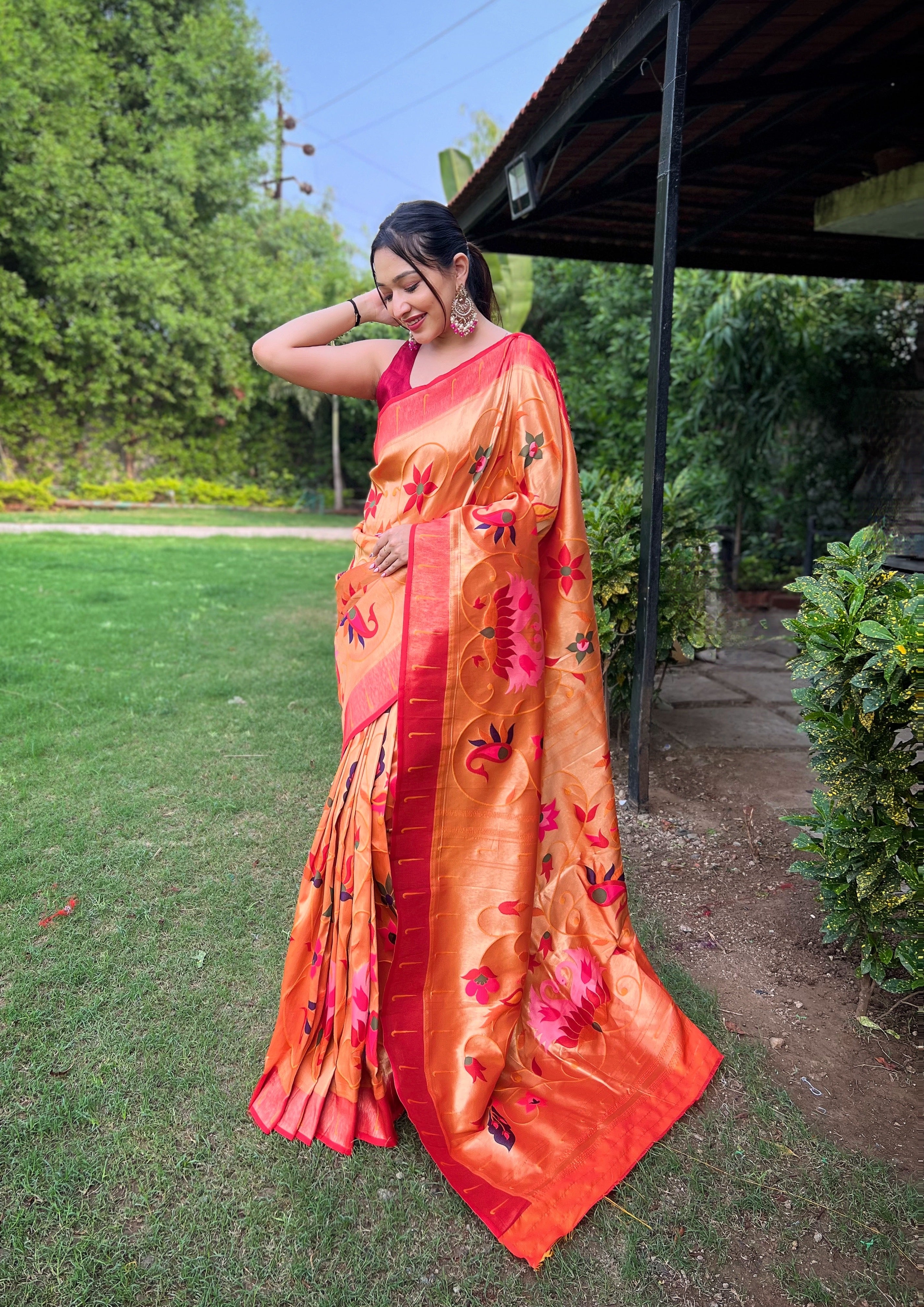 Harmonious Orange Color Paithani Silk Saree