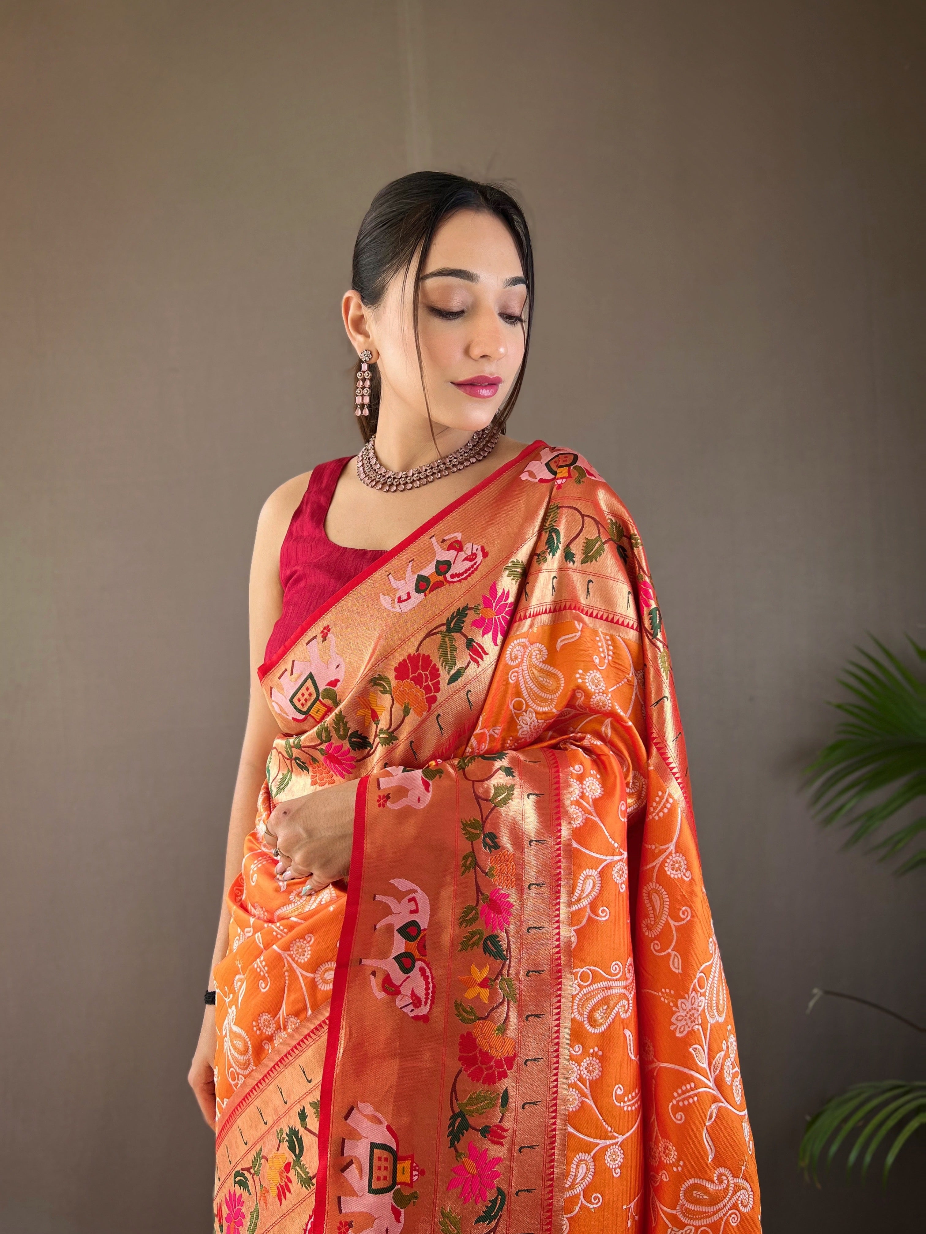 Elegant Orange Color Silk Saree with Paithani & Patola Blend