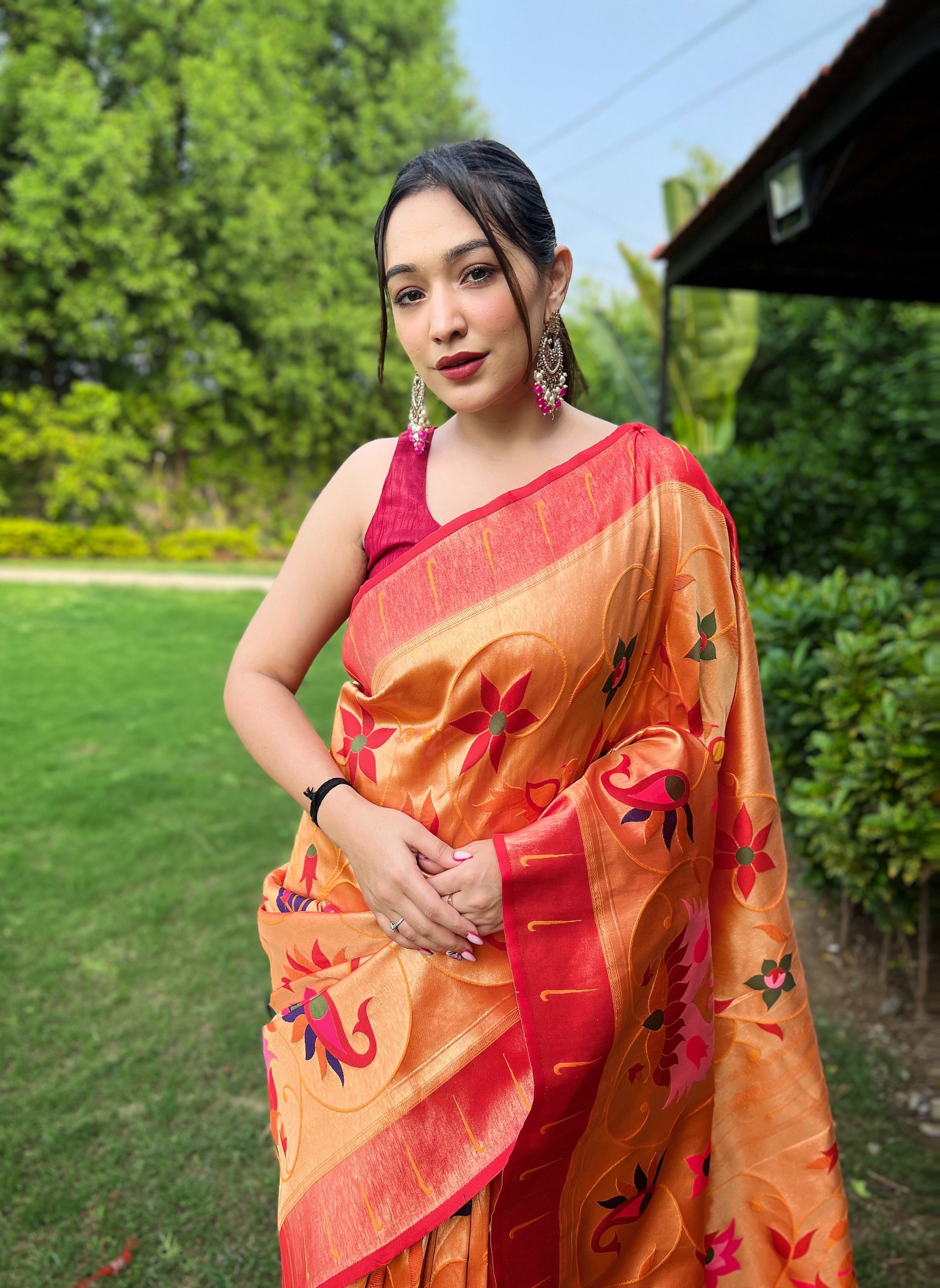 Harmonious Orange Color Paithani Silk Saree